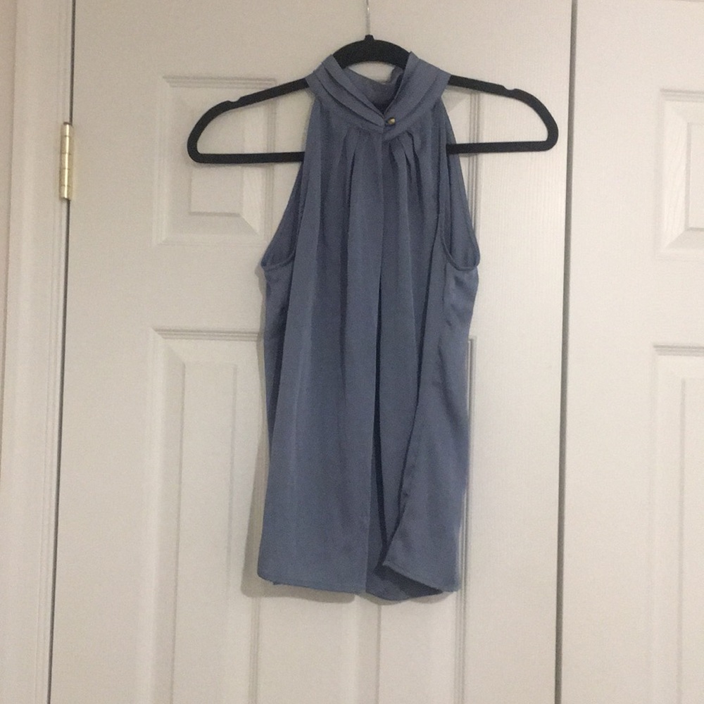 Light blue sleeveless work blouse